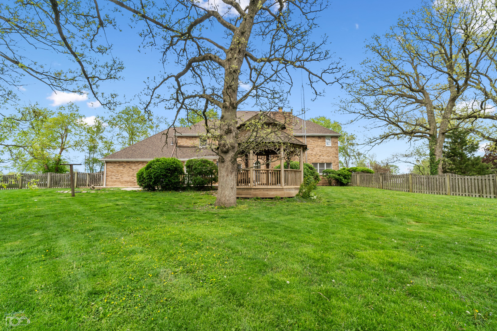 16015 West Baker Road Manhattan, IL 60442 - Photo 8 of 66 a view of a house with a yard
