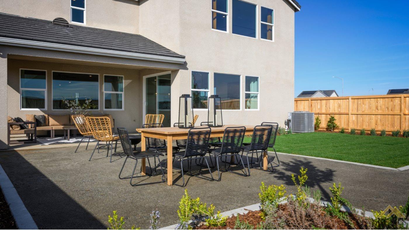 Undisclosed Address Bakersfield, CA 93313 - Photo 15 of 17 a backyard of a house with outdoor seating