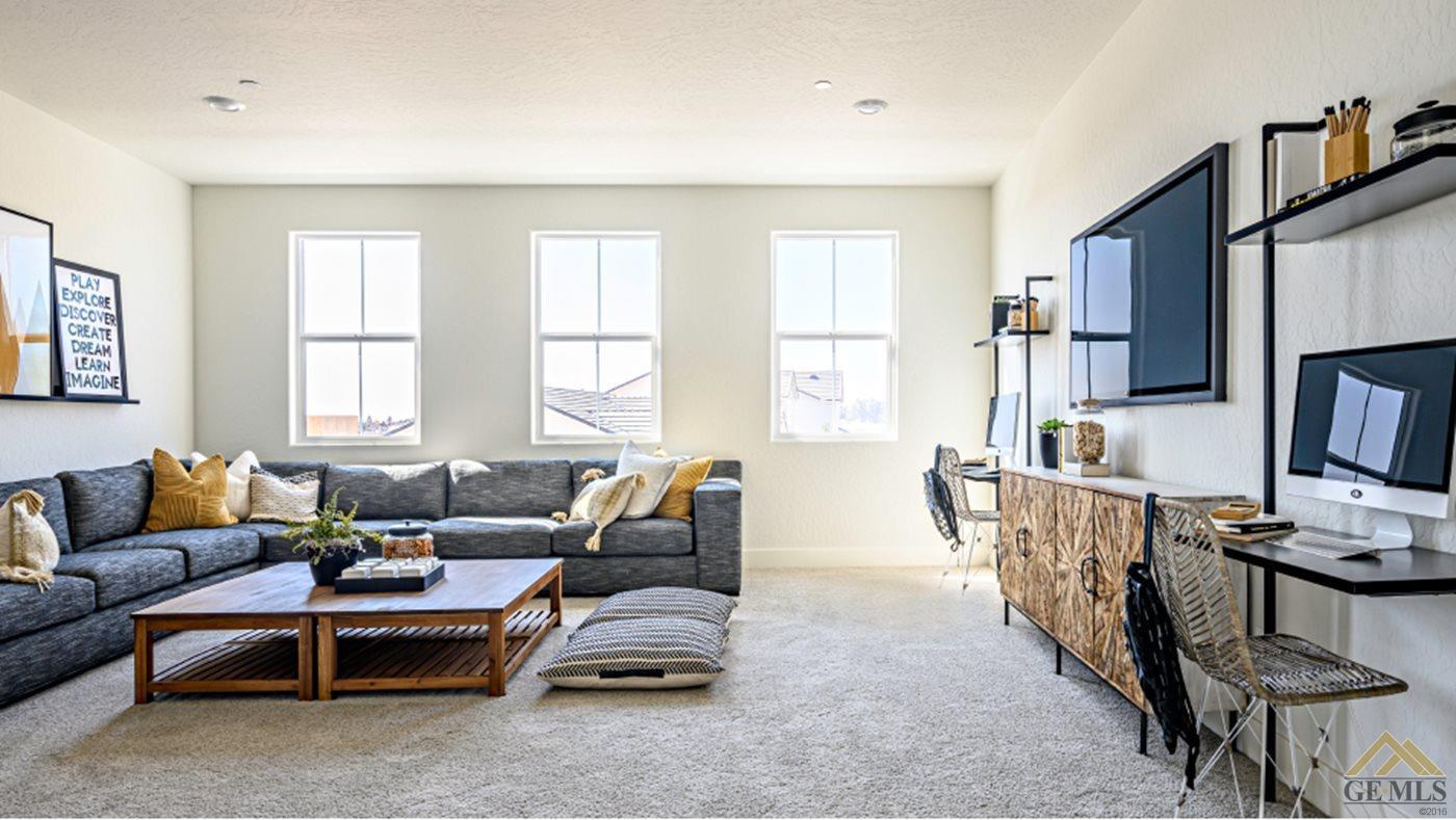 Undisclosed Address Bakersfield, CA 93313 - Photo 10 of 17 a living room with furniture a window and a flat screen tv