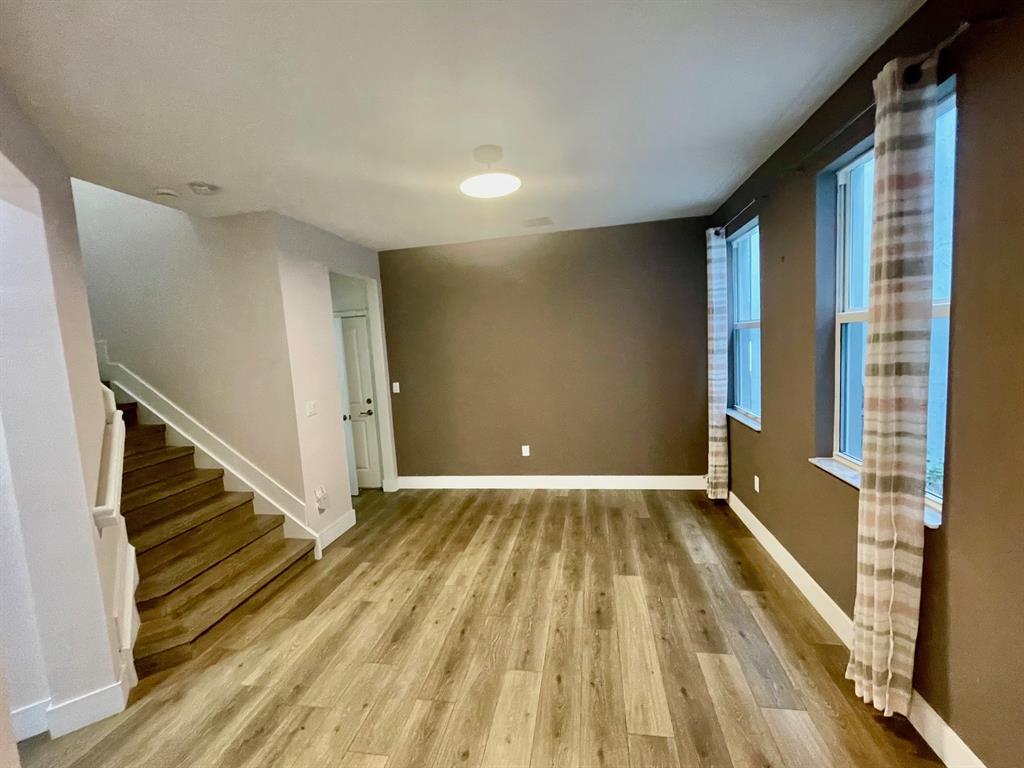 4803 Northwest 48th Terrace Tamarac, FL 33319 - Photo 6 of 28 a view of an empty room with stairs