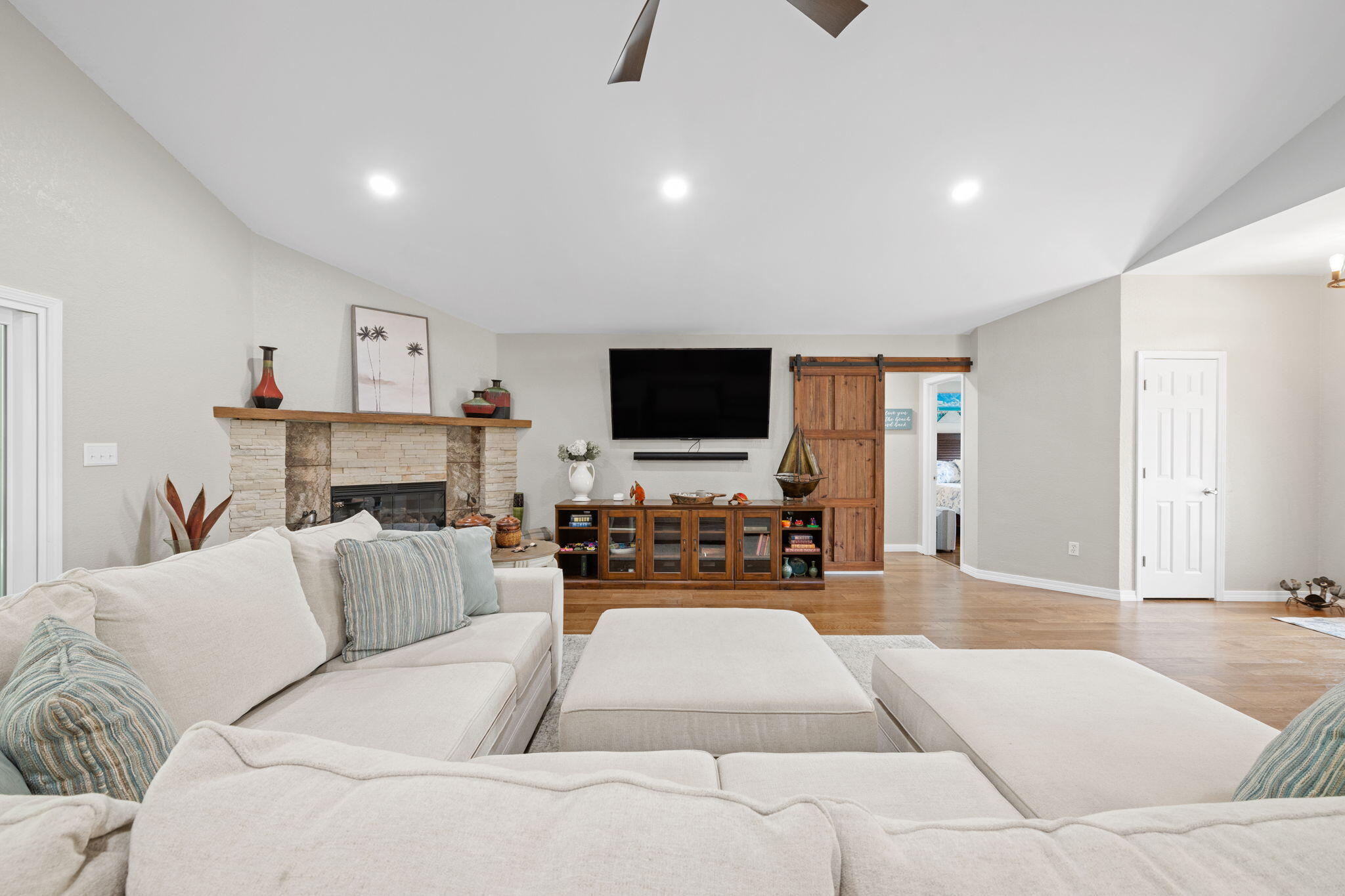 2519 Valley Road Navarre, FL 32566 - Photo 12 of 94 a living room with furniture and a flat screen tv