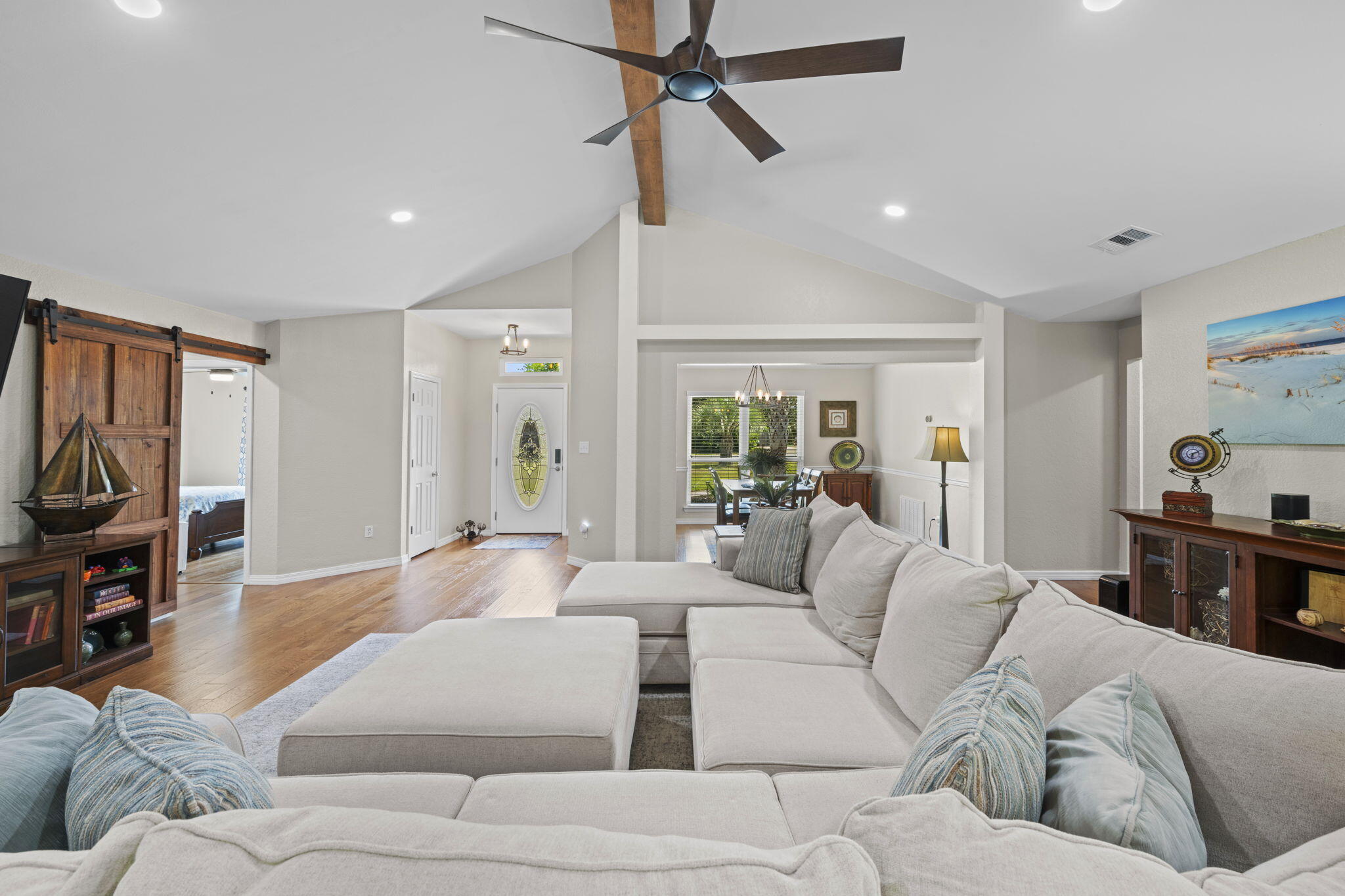 2519 Valley Road Navarre, FL 32566 - Photo 17 of 94 a living room with furniture and a flat screen tv