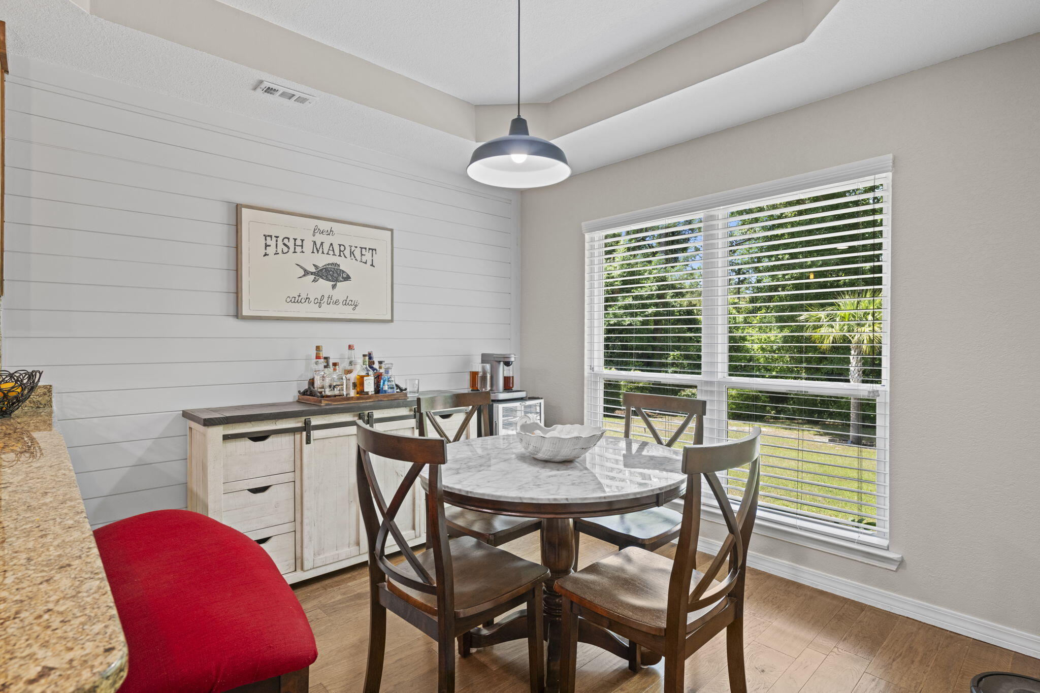 2519 Valley Road Navarre, FL 32566 - Photo 25 of 94 a view of a dining room with furniture window and outside view