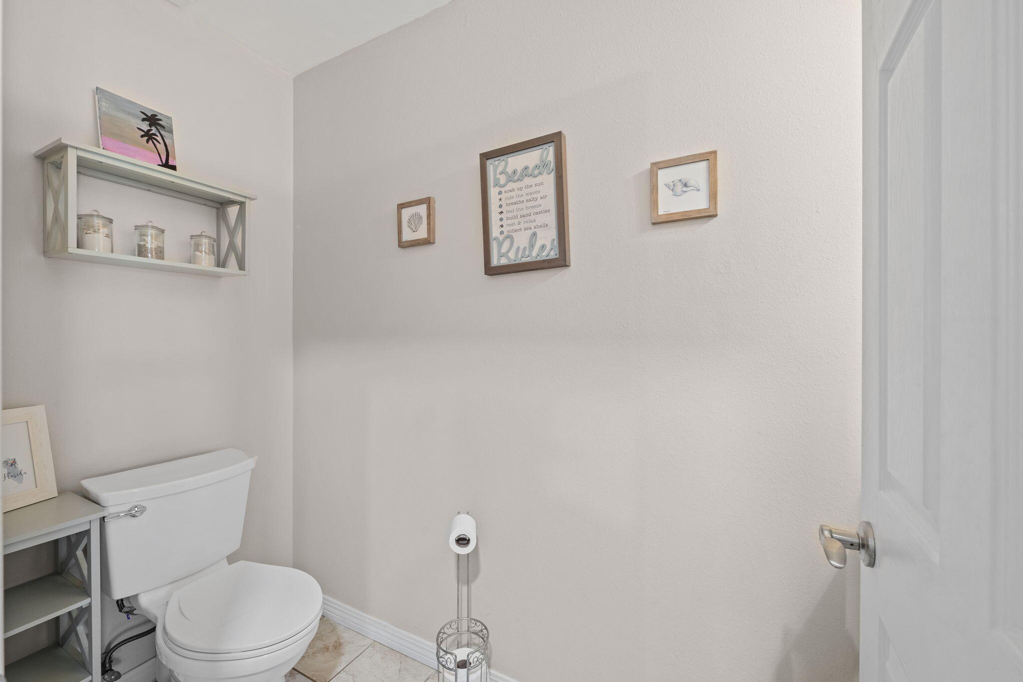 2519 Valley Road Navarre, FL 32566 - Photo 28 of 94 a white toilet sitting next to a white wall