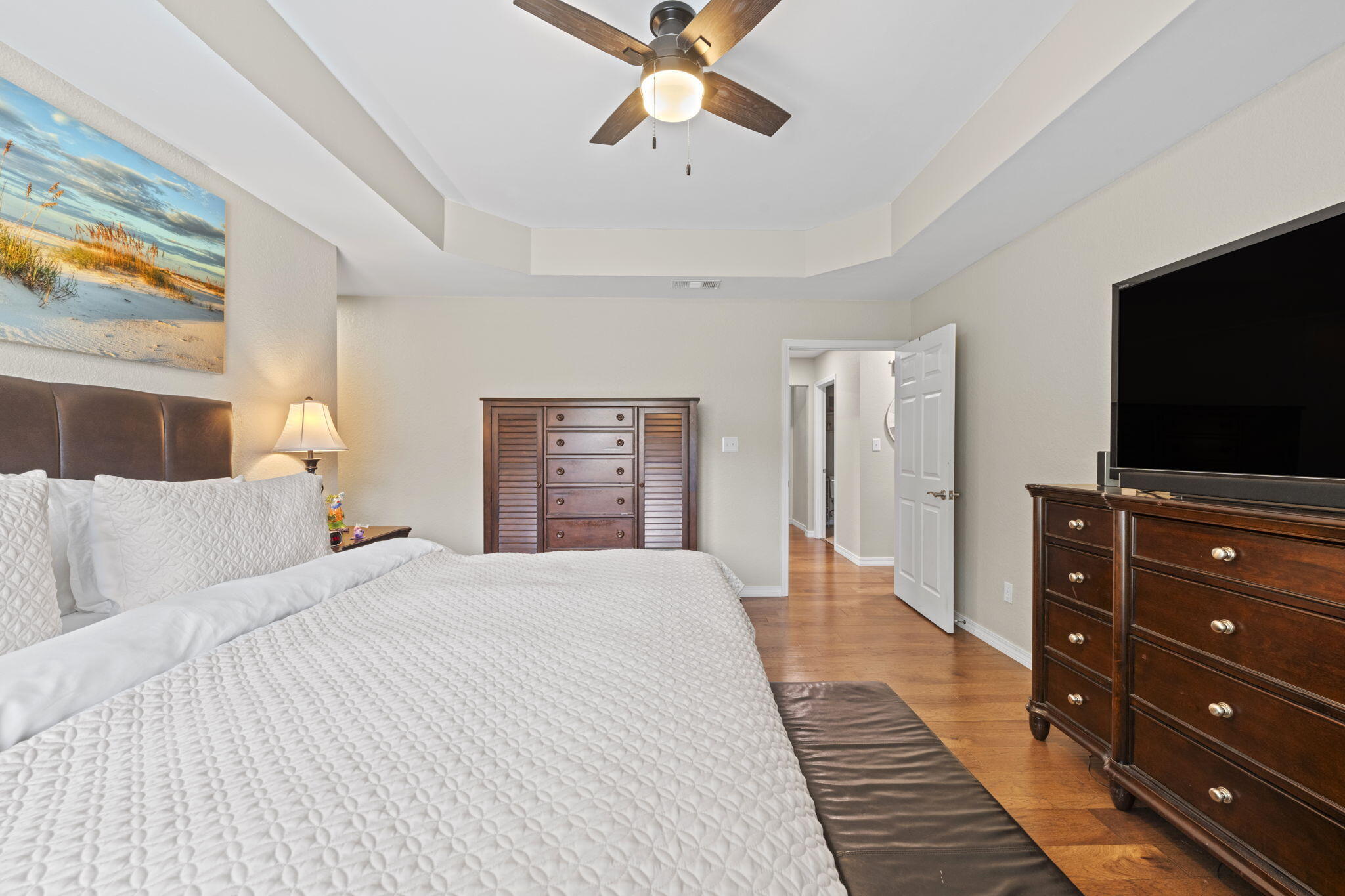 2519 Valley Road Navarre, FL 32566 - Photo 33 of 94 a bedroom with a bed and a flat screen tv