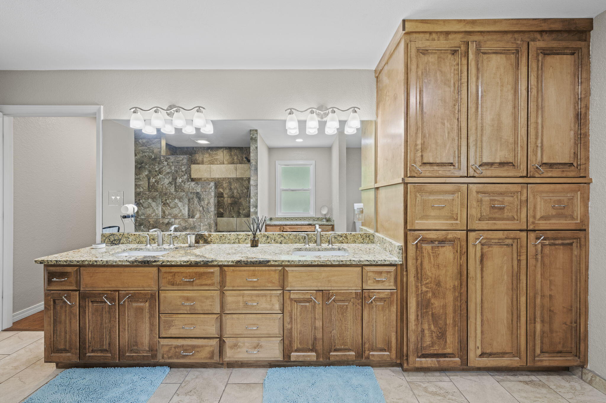 2519 Valley Road Navarre, FL 32566 - Photo 37 of 94 a bathroom with a granite countertop sink and a mirror
