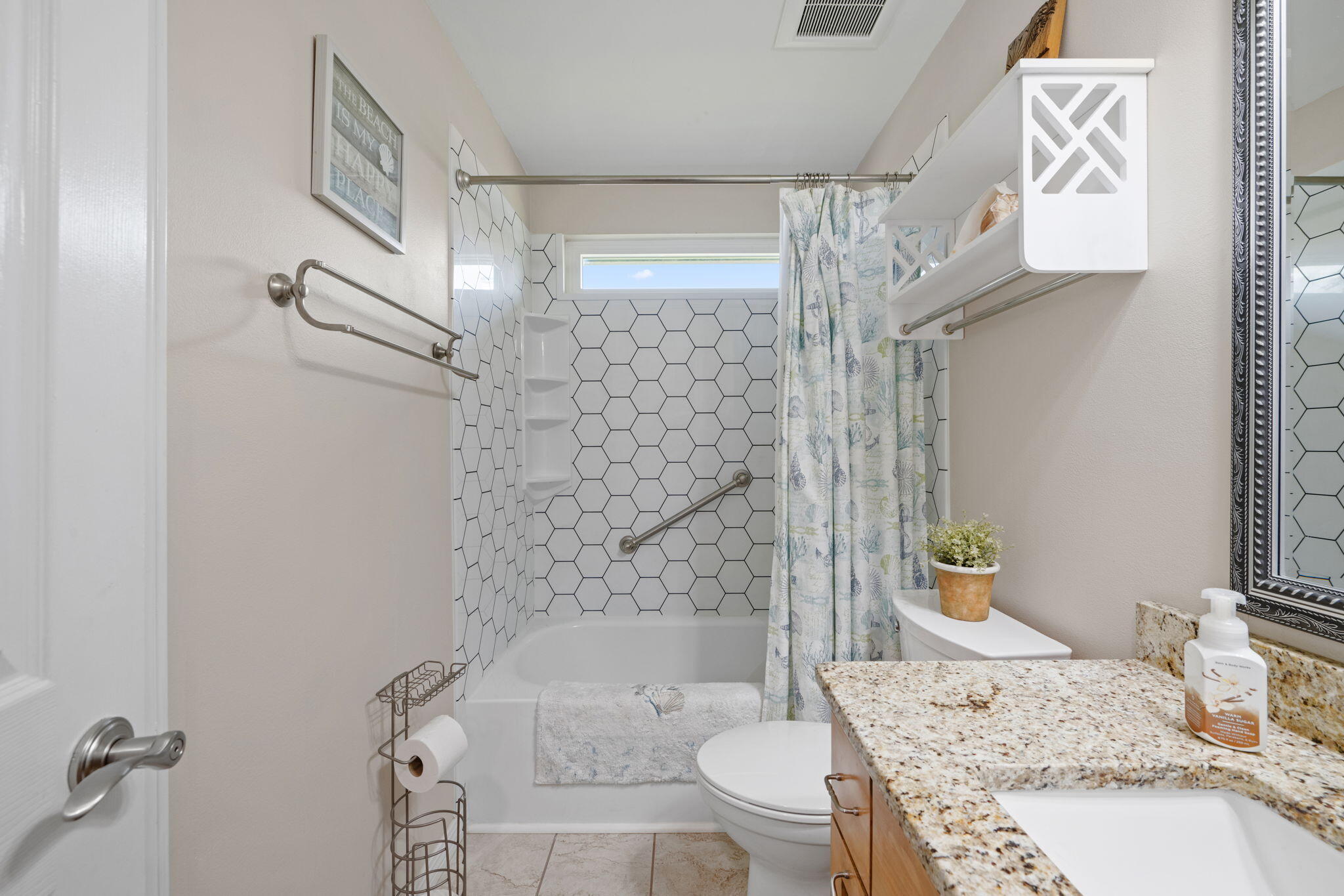 2519 Valley Road Navarre, FL 32566 - Photo 47 of 94 a bathroom with a sink toilet and shower