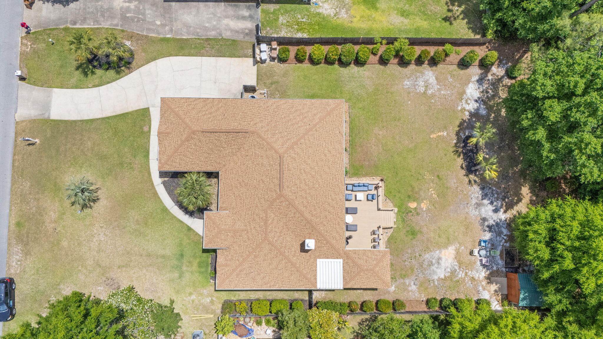 2519 Valley Road Navarre, FL 32566 - Photo 69 of 94 an aerial view of a house with outdoor space and a lake view