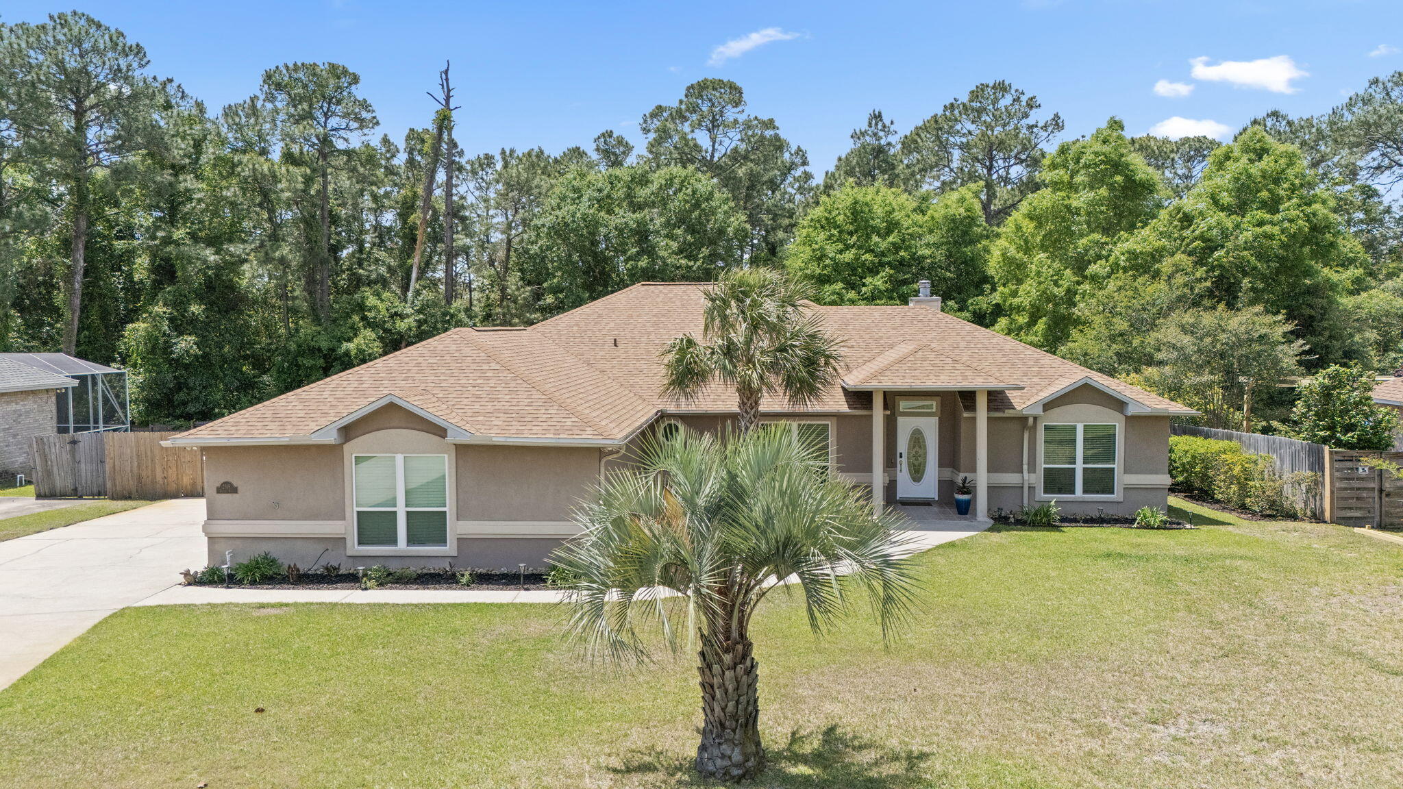 2519 Valley Road Navarre, FL 32566 - Photo 71 of 94 a front view of a house with a yard
