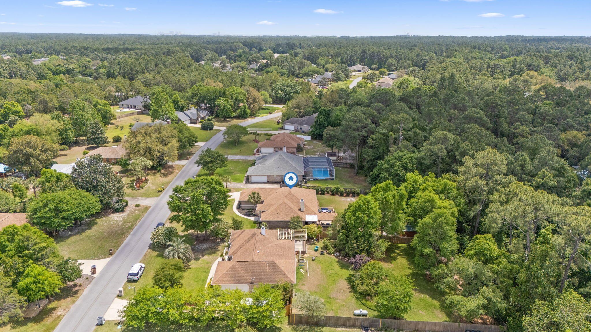 2519 Valley Road Navarre, FL 32566 - Photo 76 of 94 an aerial view of residential houses with outdoor space and trees