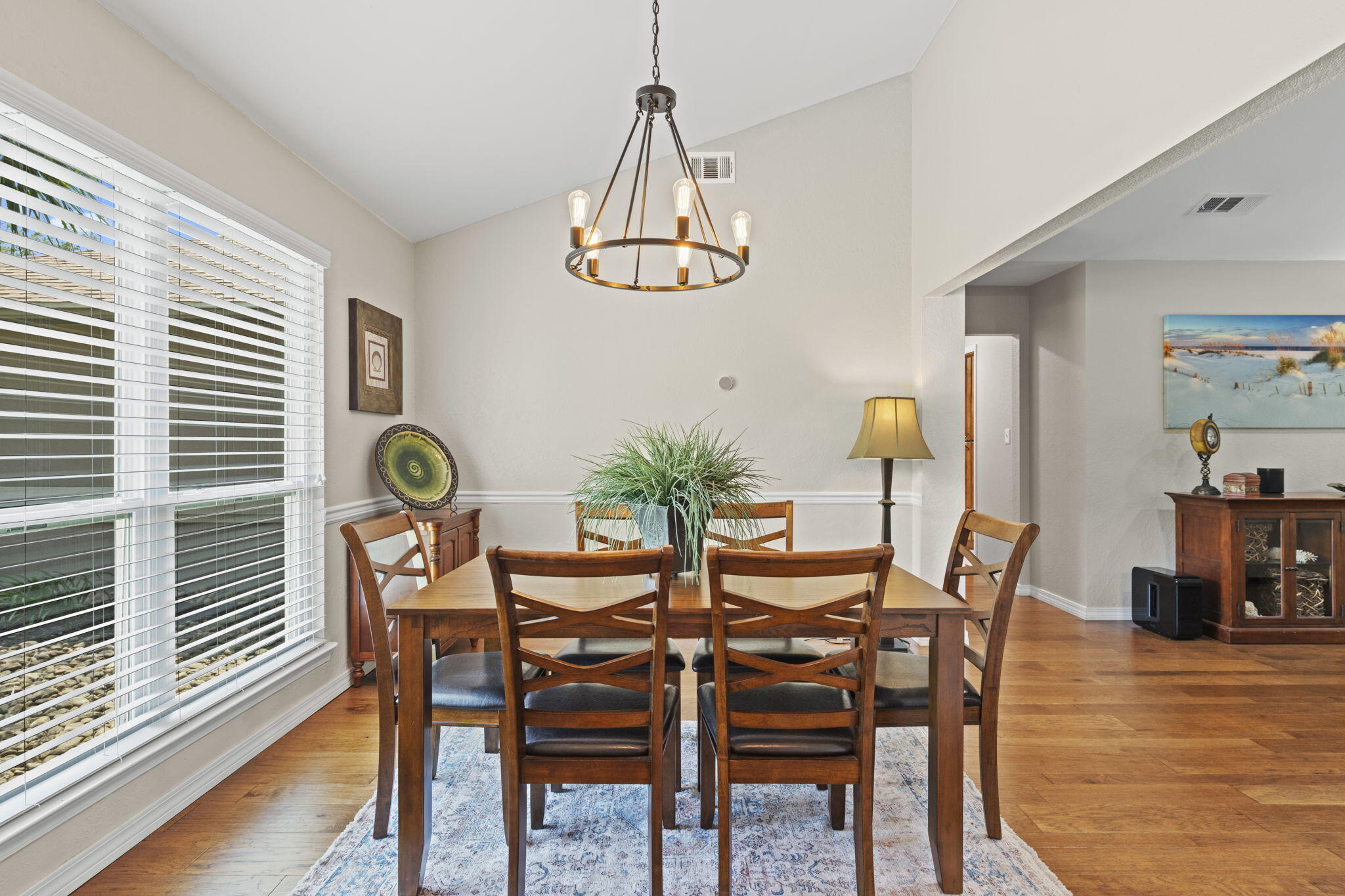 2519 Valley Road Navarre, FL 32566 - Photo 9 of 94 a view of a dining room with furniture and wooden floor