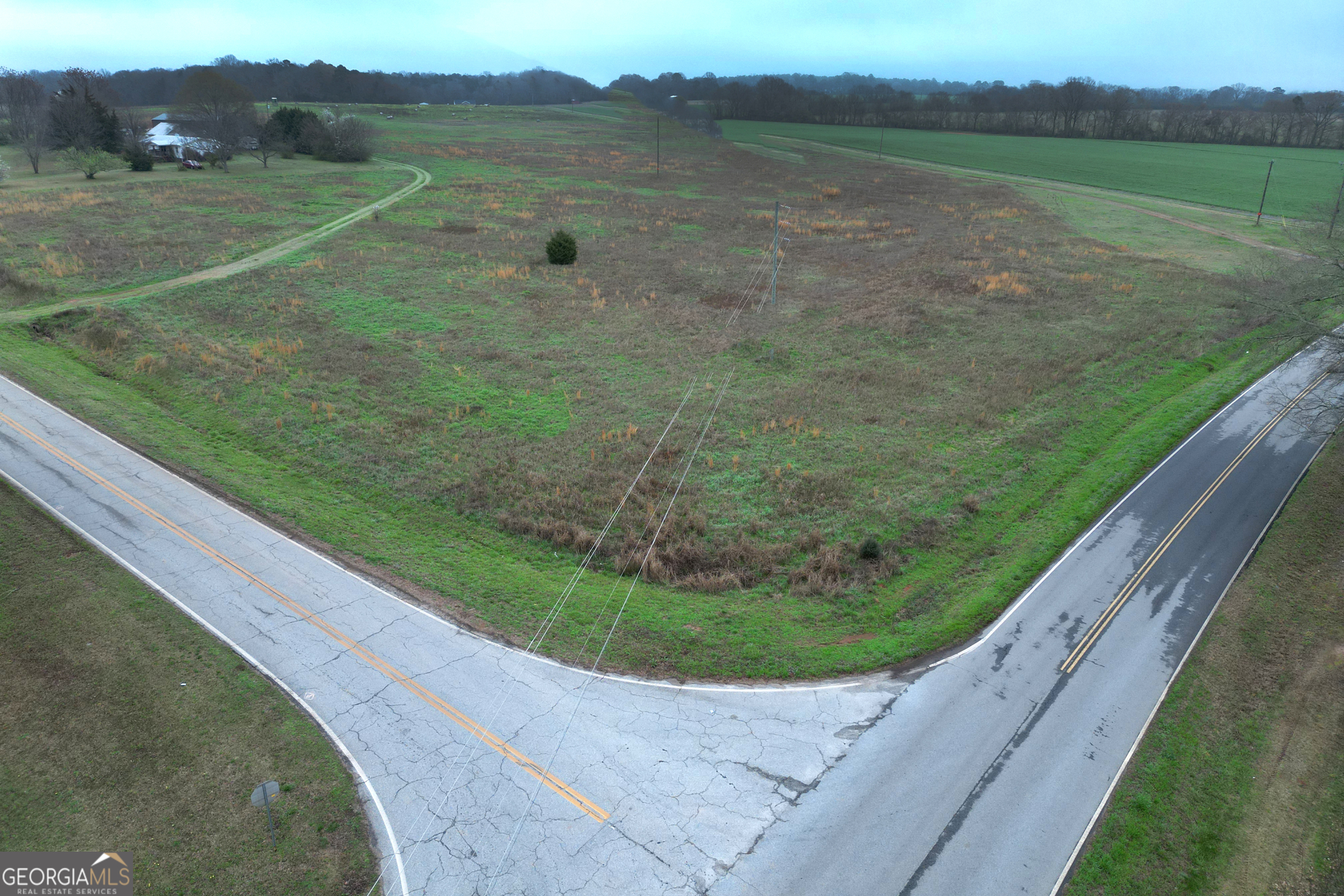 0 Broughton Road Newborn, GA 30650 - Photo 1 of 15 a view of a lake with a big yard