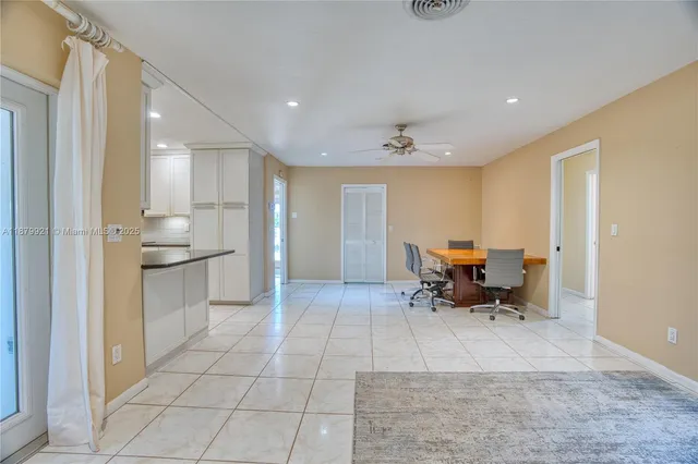 a view of kitchen with breakfast area