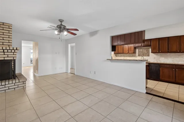 a view of a kitchen with a sink and a microwave