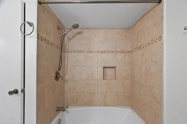 a view of empty room with windows