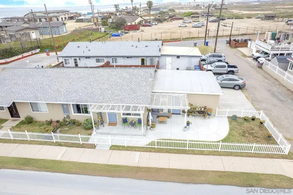 a view of a balcony with wooden floor