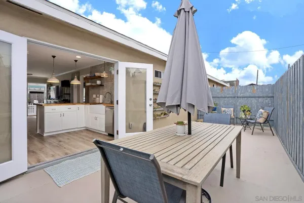 a outdoor space with lots of tables and chairs