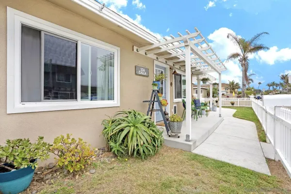 front view of a house with a small yard