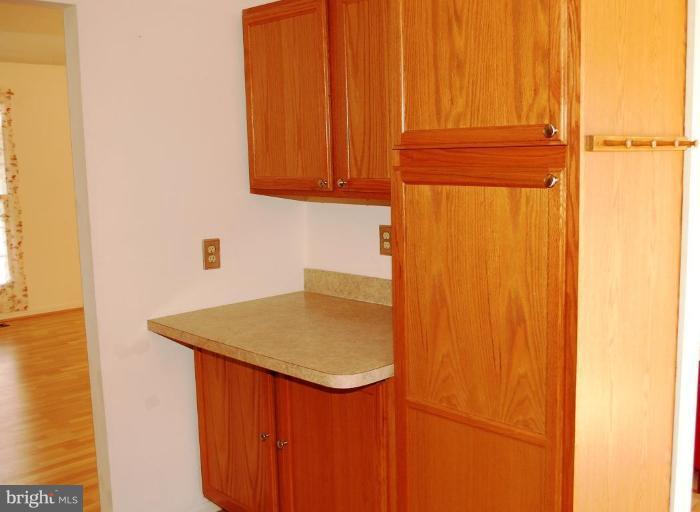 Built in pantry and added counter space.