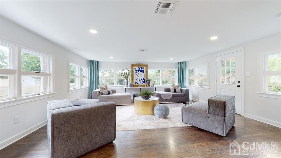 243 Old Tote Road Mountainside, NJ 07092 - Photo 13 of 42 a living room with furniture and a large window