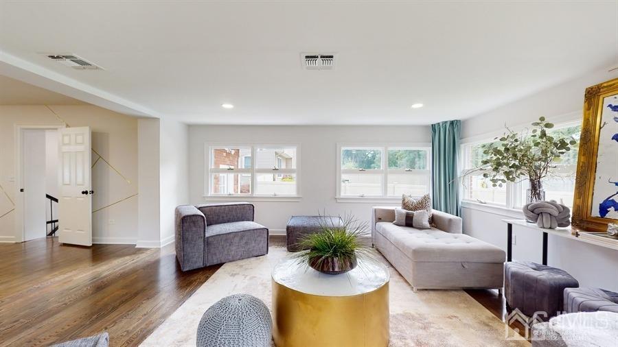 243 Old Tote Road Mountainside, NJ 07092 - Photo 15 of 42 a living room with furniture and a large window