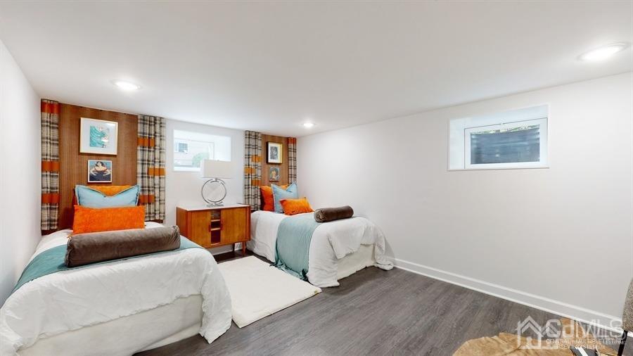 243 Old Tote Road Mountainside, NJ 07092 - Photo 34 of 42 a bedroom with furniture and wooden floor