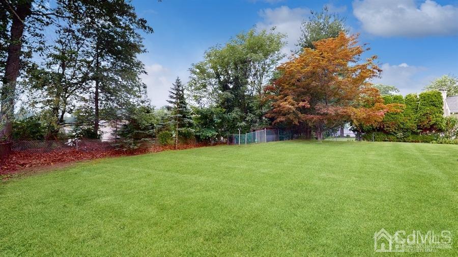 243 Old Tote Road Mountainside, NJ 07092 - Photo 39 of 42 a view of a field of grass and trees