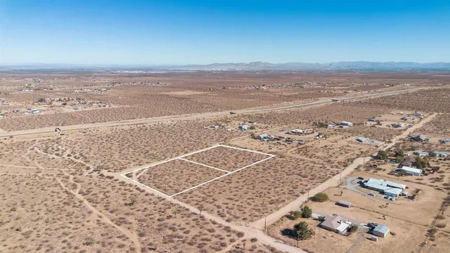 an aerial view of beach and ocean