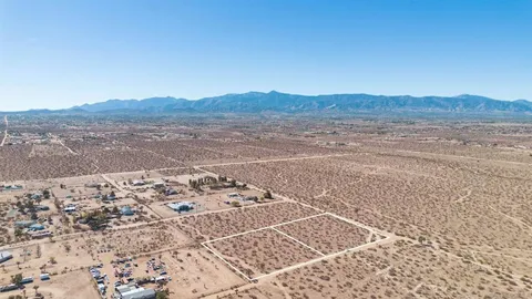 a view of an ocean and a mountain