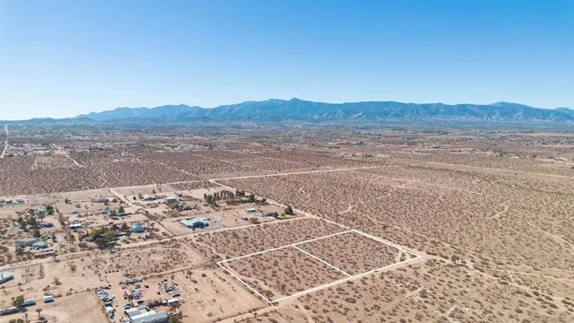 a view of an ocean and a mountain