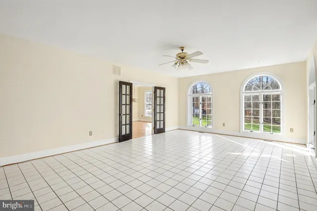 an empty room with windows