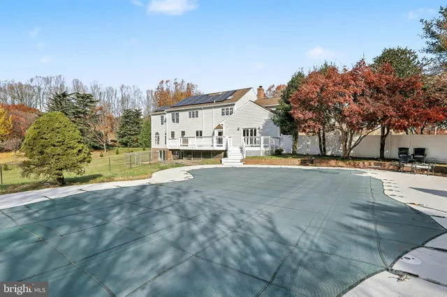 a view of city street with large trees