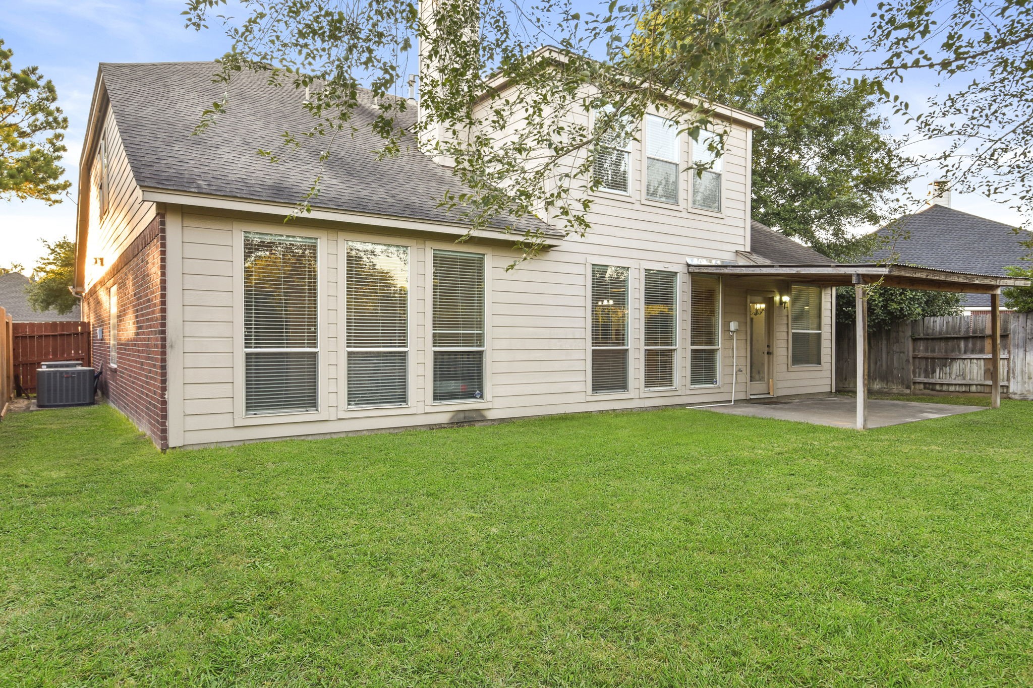 8550 Waiting Spring Circle Houston, TX 77095 - Photo 27 of 32 front view of a house with a yard