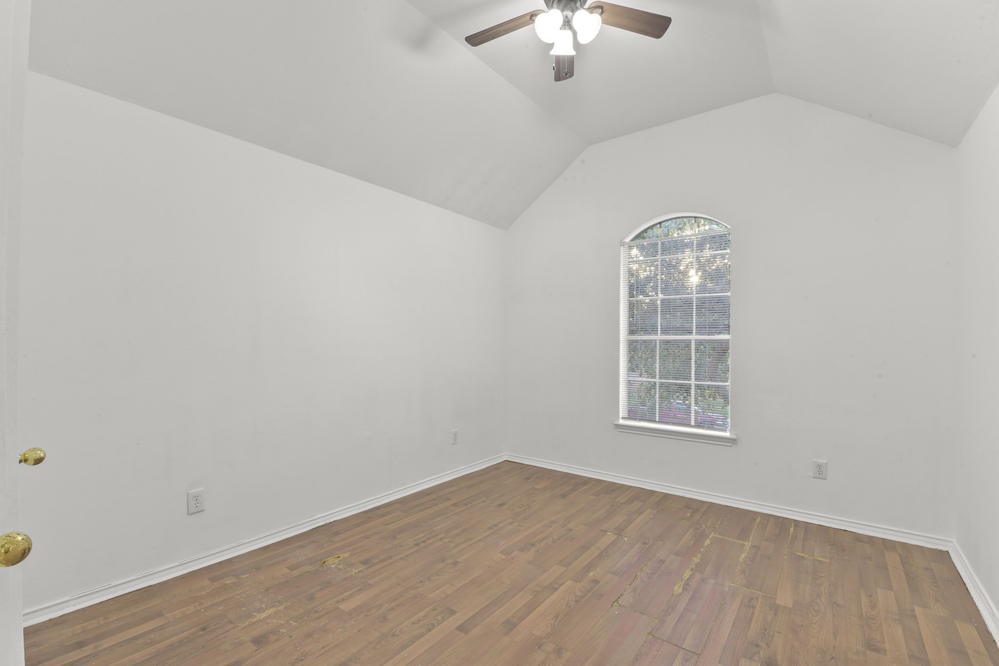 8550 Waiting Spring Circle Houston, TX 77095 - Photo 29 of 32 an empty room with wooden floor chandelier and windows