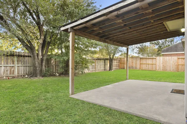 a view of backyard with green space