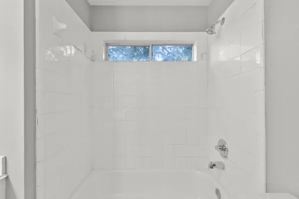 a bathroom with a bathtub