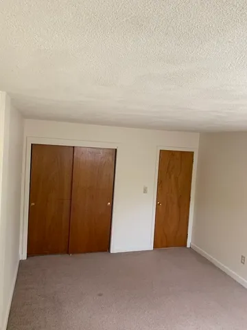 an empty room with closet