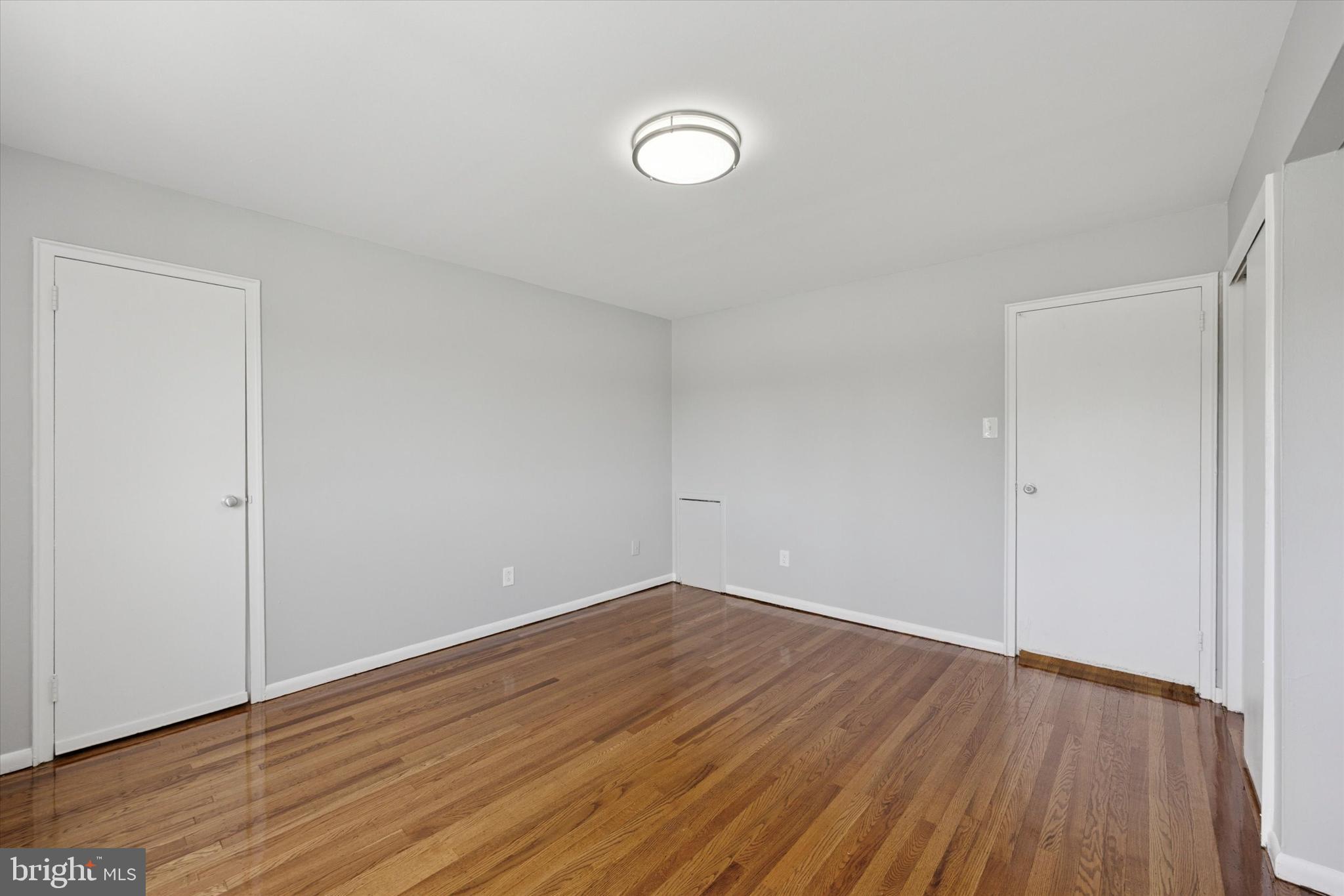 8410 Bustleton Avenue, Unit A 14 Philadelphia, PA 19152 - Photo 5 of 15 a view of empty room with wooden floor