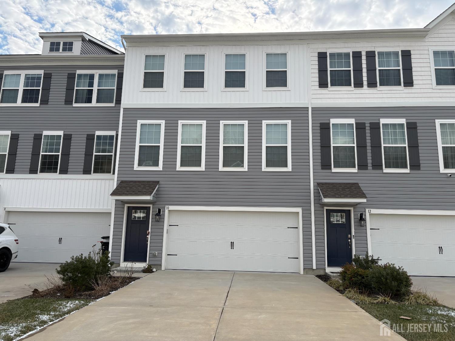 a view of a brick building with many windows
