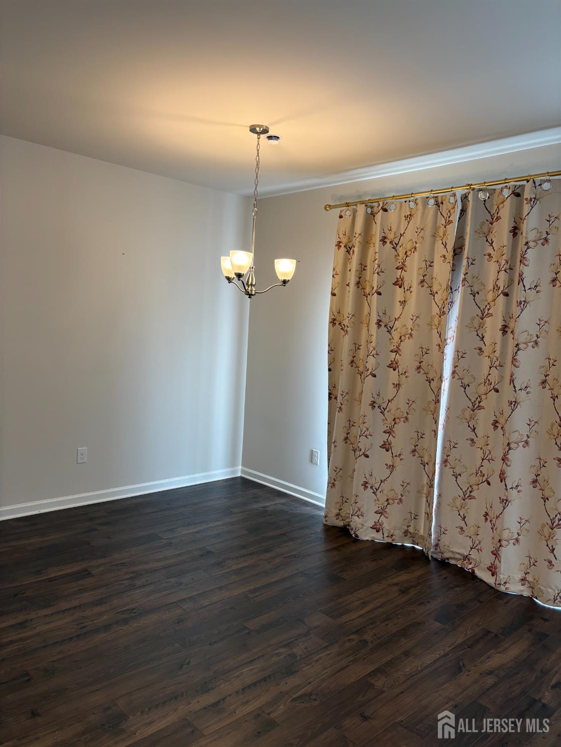 10 Stanton Rd Mount Mount Holly, NJ 08060 - Photo 3 of 8 wooden floor in an empty room