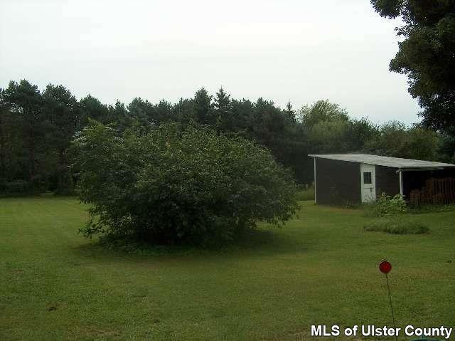 171 Pine Bush Road, Unit CONTINGENCY CONT TO SHOW Stone Ridge, NY 12484 - Photo 4 of 4 a view of a backyard