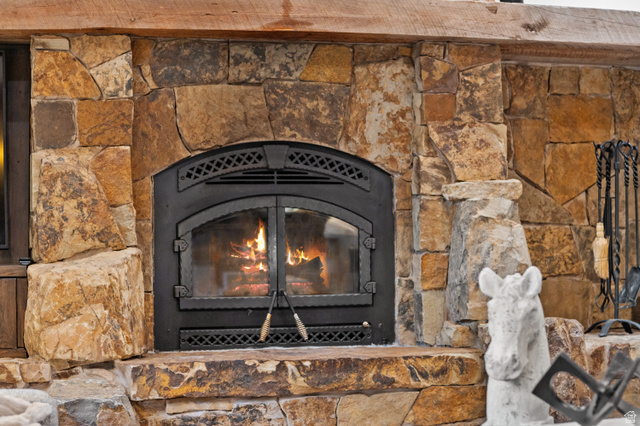 10280 Dimple Dell Road Sandy, UT 84092 - Photo 11 of 58 Detailed view of a glass covered fireplace