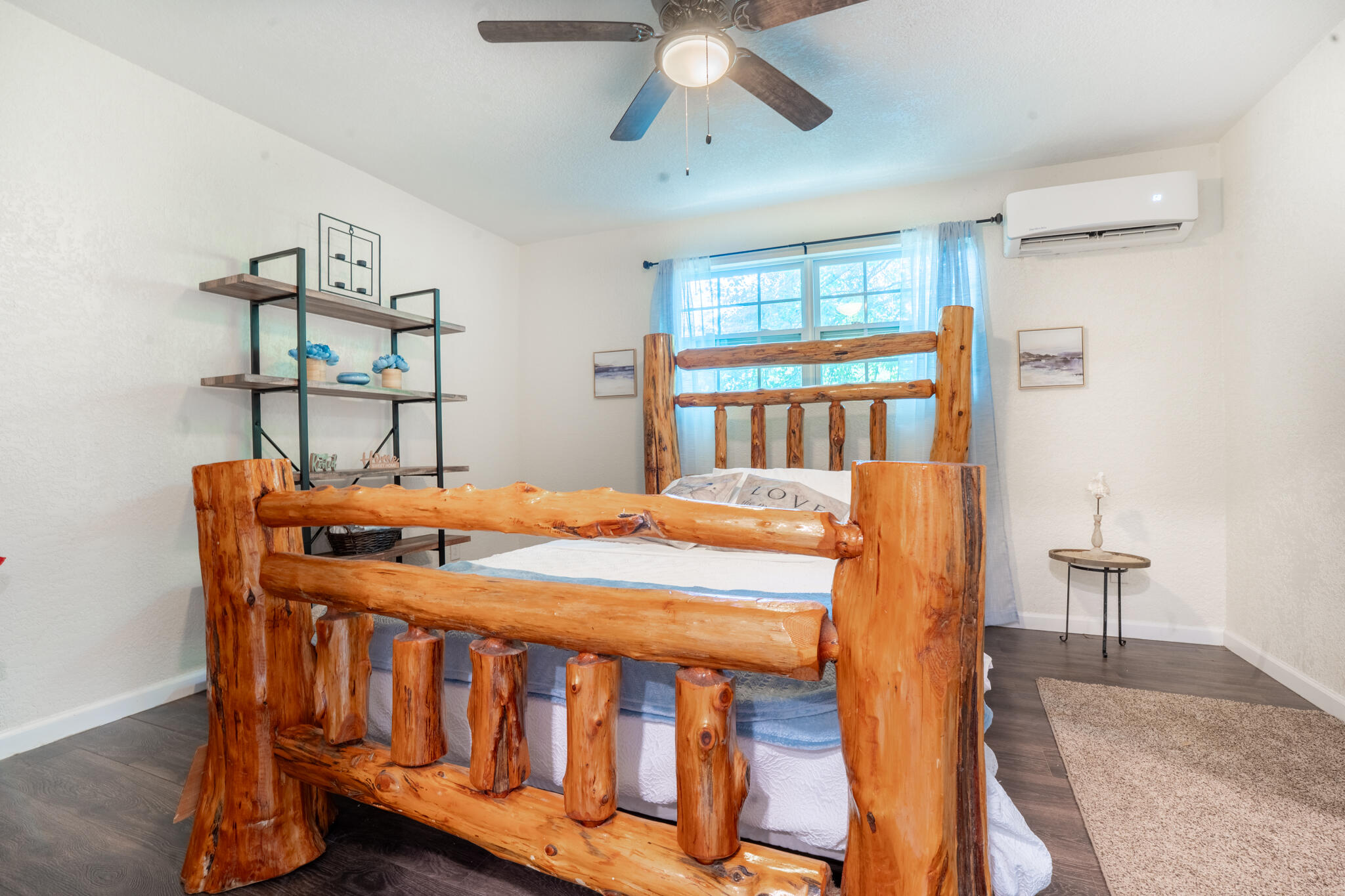 156 Lindberg Street Crestview, FL 32536 - Photo 18 of 25 a bedroom with a bed a table and chair