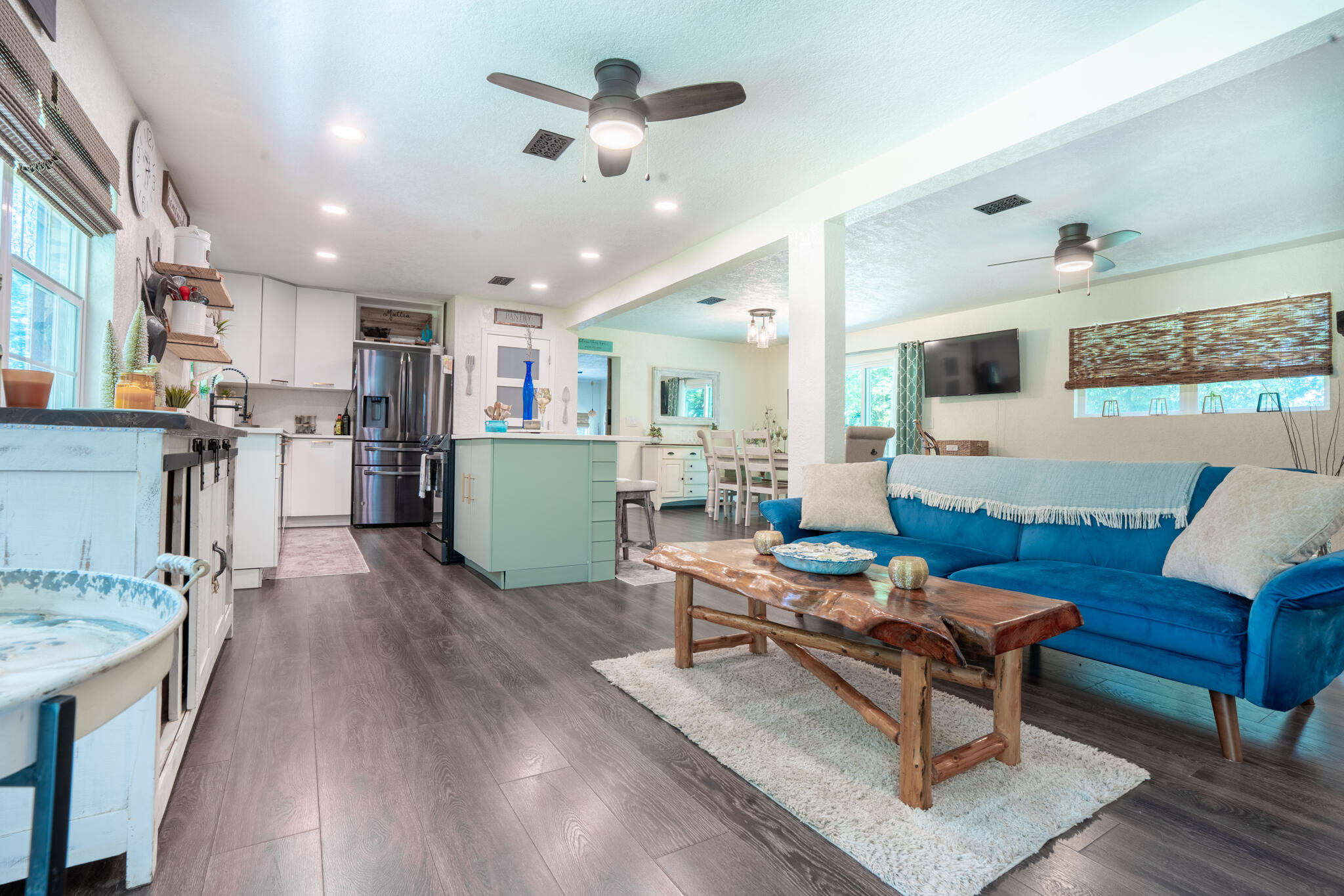 156 Lindberg Street Crestview, FL 32536 - Photo 5 of 25 a living room with furniture and a wooden floor