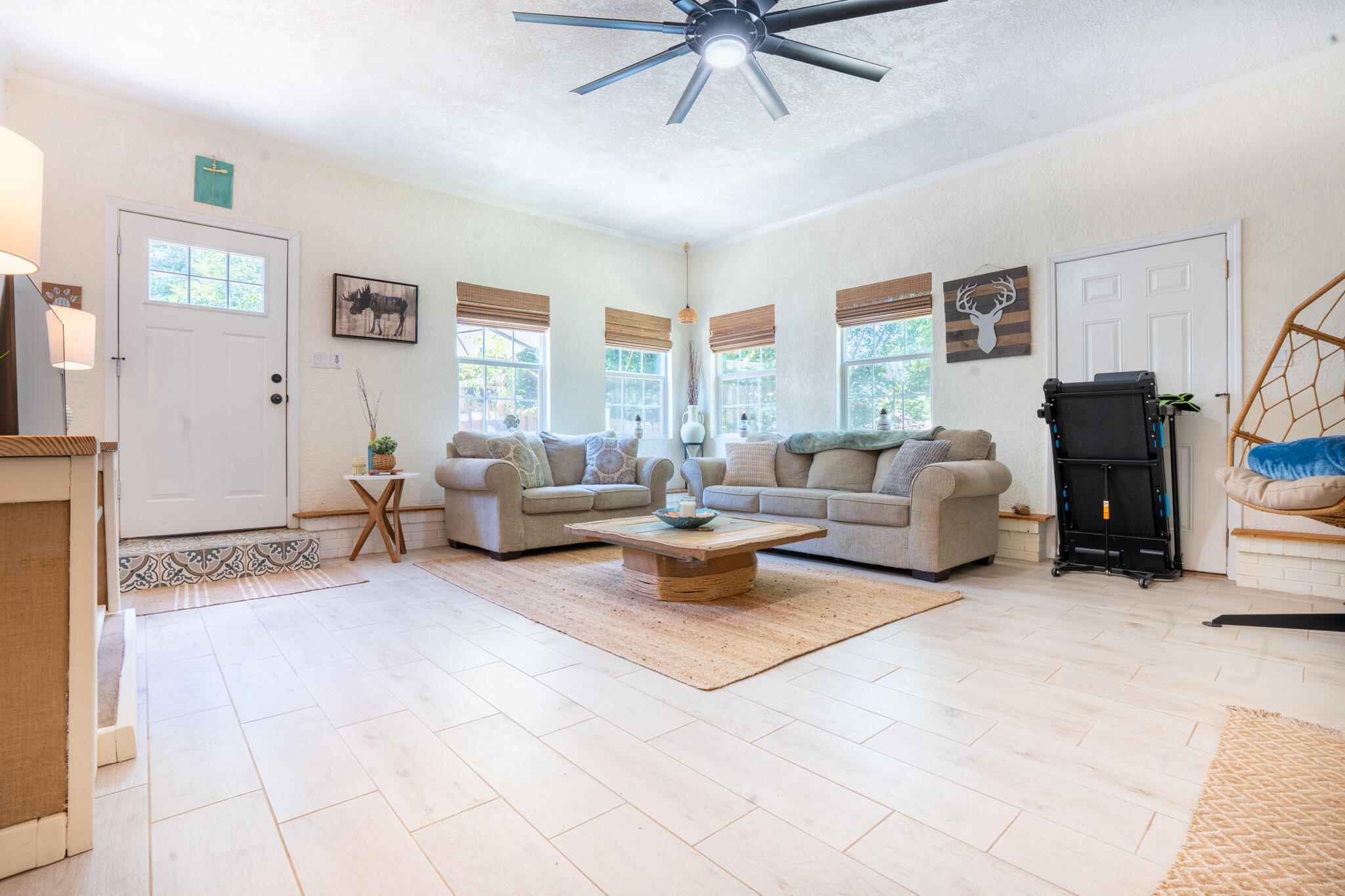 156 Lindberg Street Crestview, FL 32536 - Photo 9 of 25 a living room with furniture and a flat screen tv