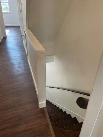 a view of entryway with wooden floor