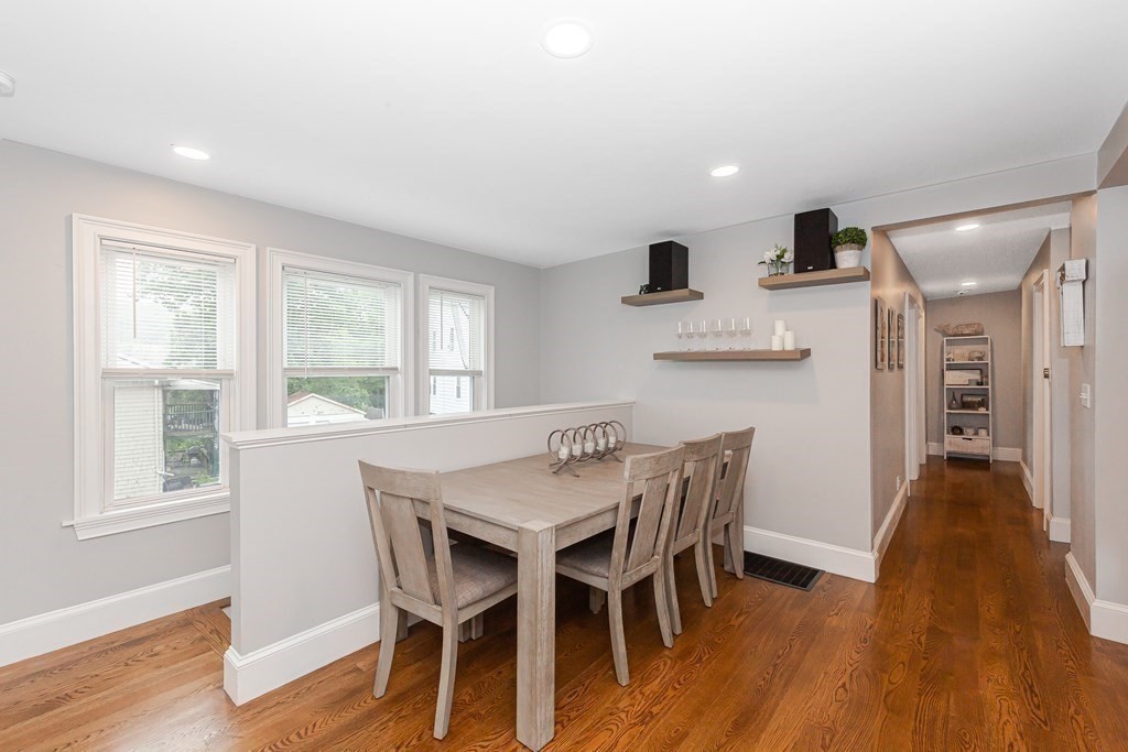 26 Foss Street, Unit 1 Medford, MA 02155 - Photo 13 of 35 a view of a dining room with furniture and wooden floor