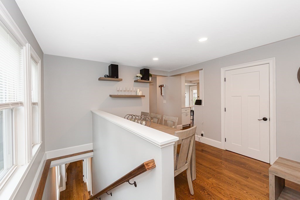 26 Foss Street, Unit 1 Medford, MA 02155 - Photo 14 of 35 a kitchen with a sink a stove and wooden floor