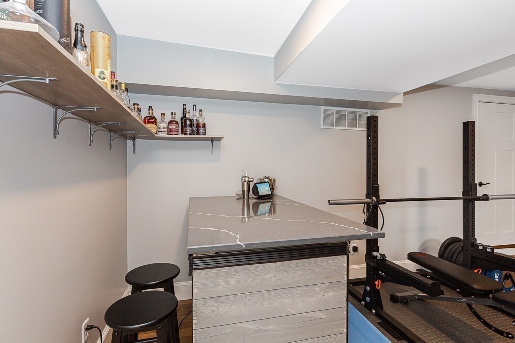 26 Foss Street, Unit 1 Medford, MA 02155 - Photo 23 of 35 a kitchen with a refrigerator and a sink
