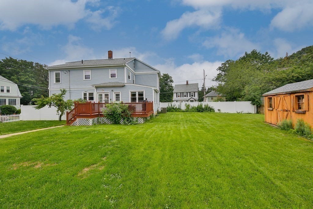 26 Foss Street, Unit 1 Medford, MA 02155 - Photo 4 of 35 a front view of house with yard and green space